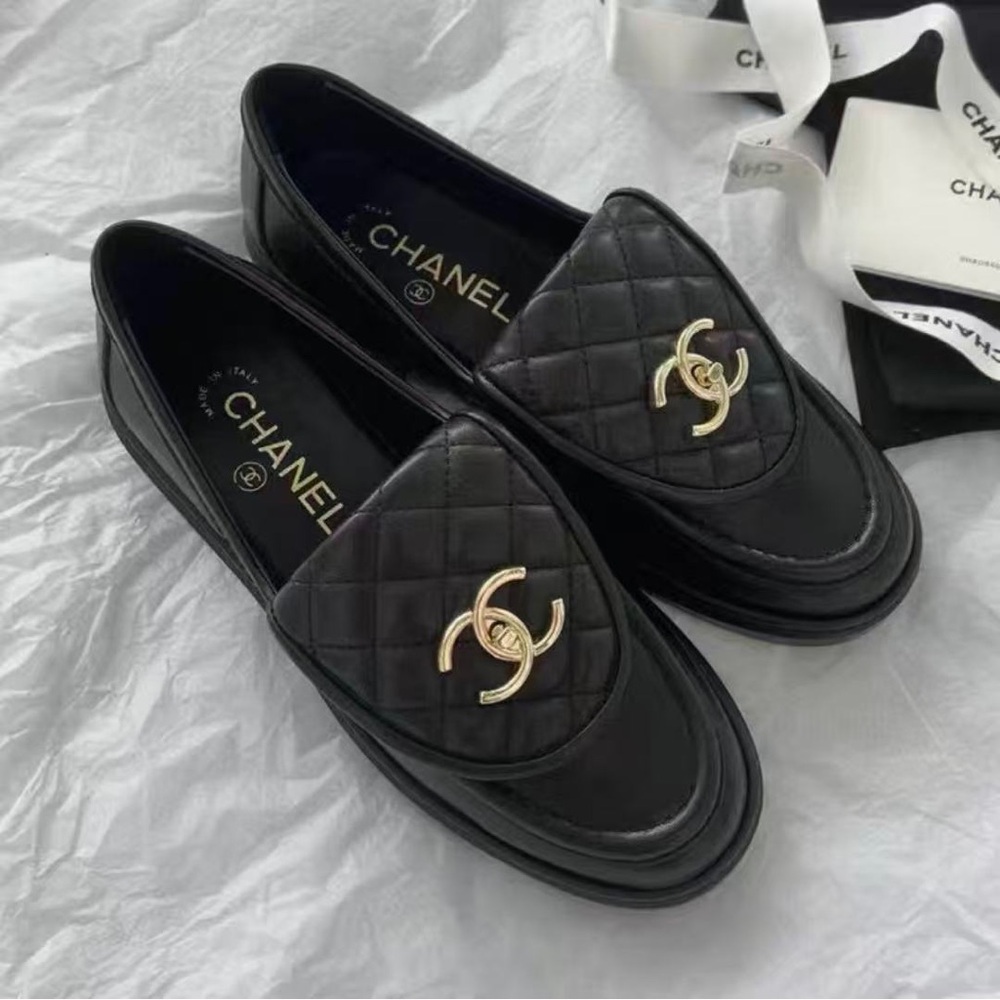 CHANEL Quilted Black Loafers with Gold Logo